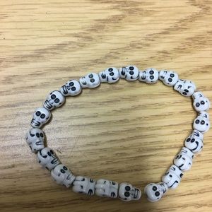 Two skull bead bracelets